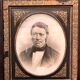 Black and gilded ebonite frame, wood and plaster 19th century