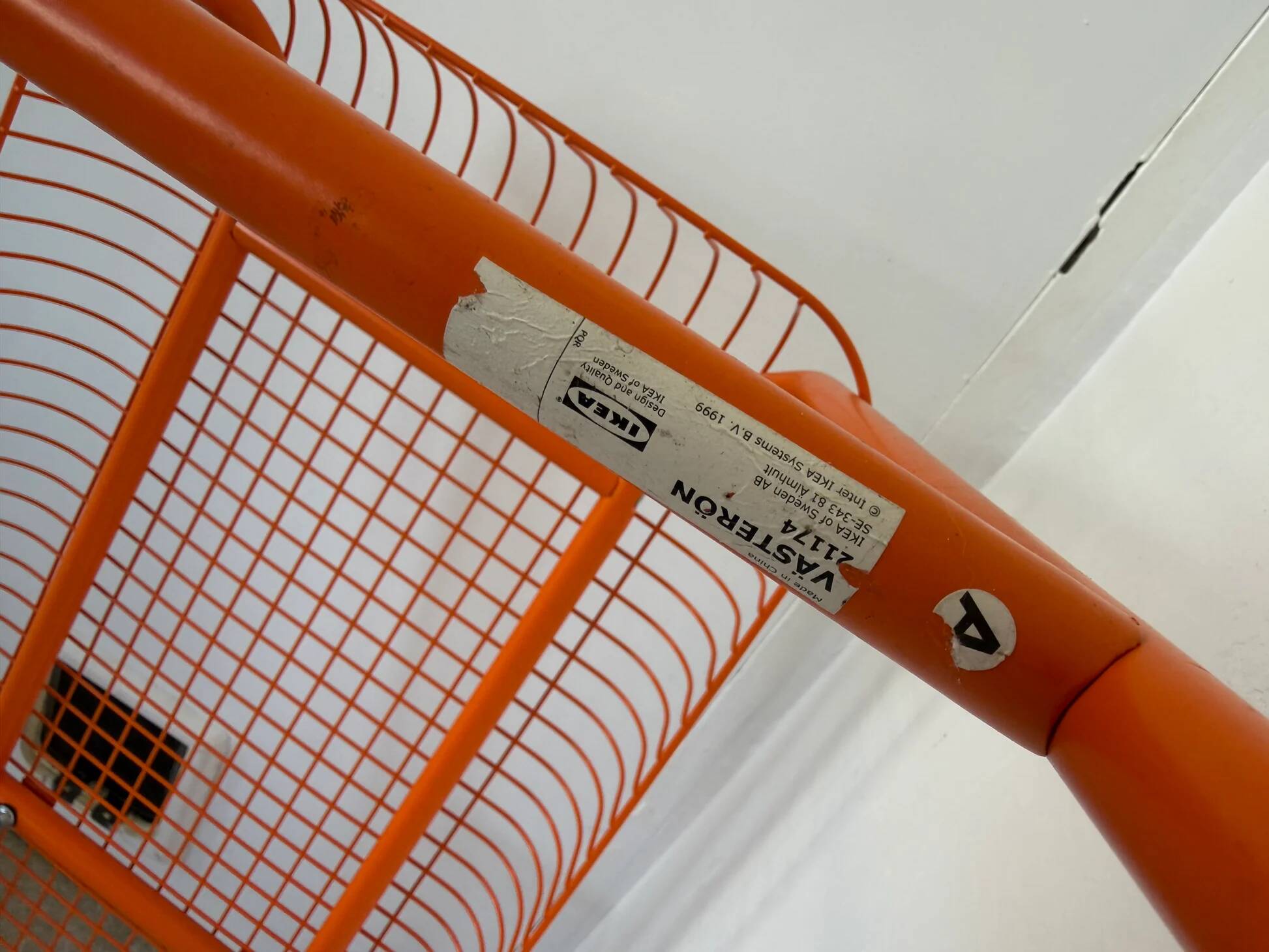 IKEA bench model Vasteron in orange lacquered metal