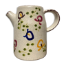 Ceramic water pitcher decorated with flowers