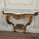 Louis XV style console in carved and gilded wood, circa 1880.