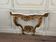Louis XV style console in carved and gilded wood, circa 1880.