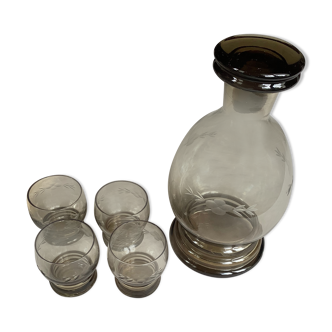 Smoked glass carafe and four glasses
