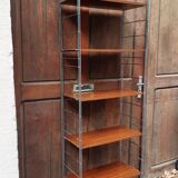 Wall bookcase string 1970