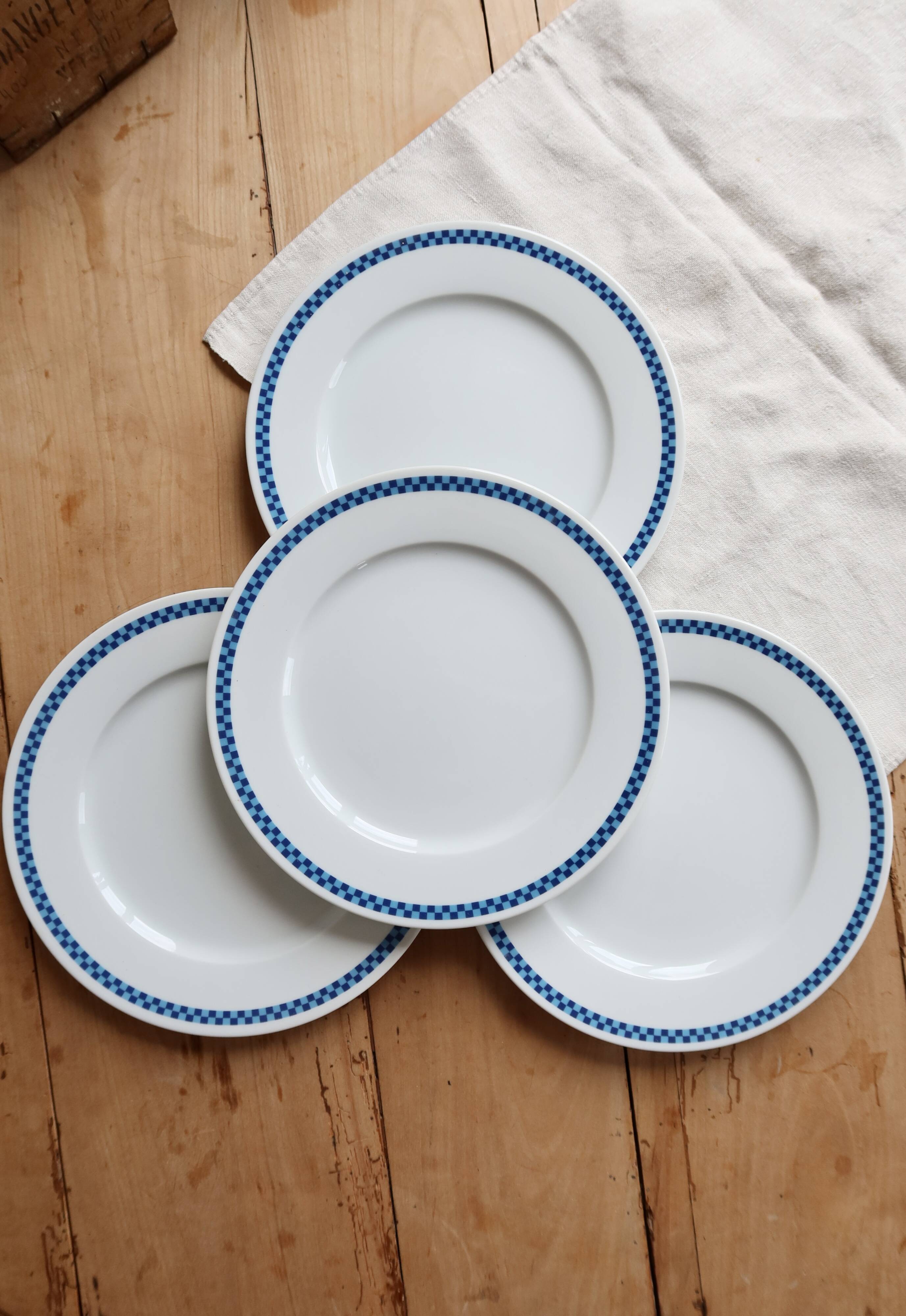 4 vintage Lustucru plates in porcelain with a blue checkered pattern.