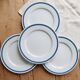 4 vintage Lustucru plates in porcelain with a blue checkered pattern.