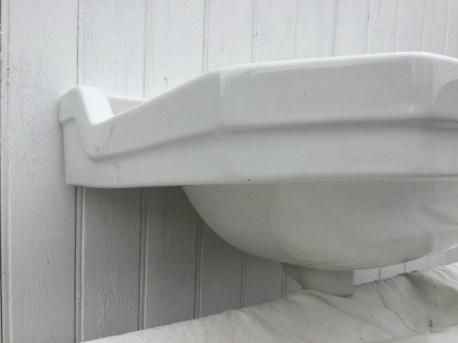 White ceramic washbasin, 1950