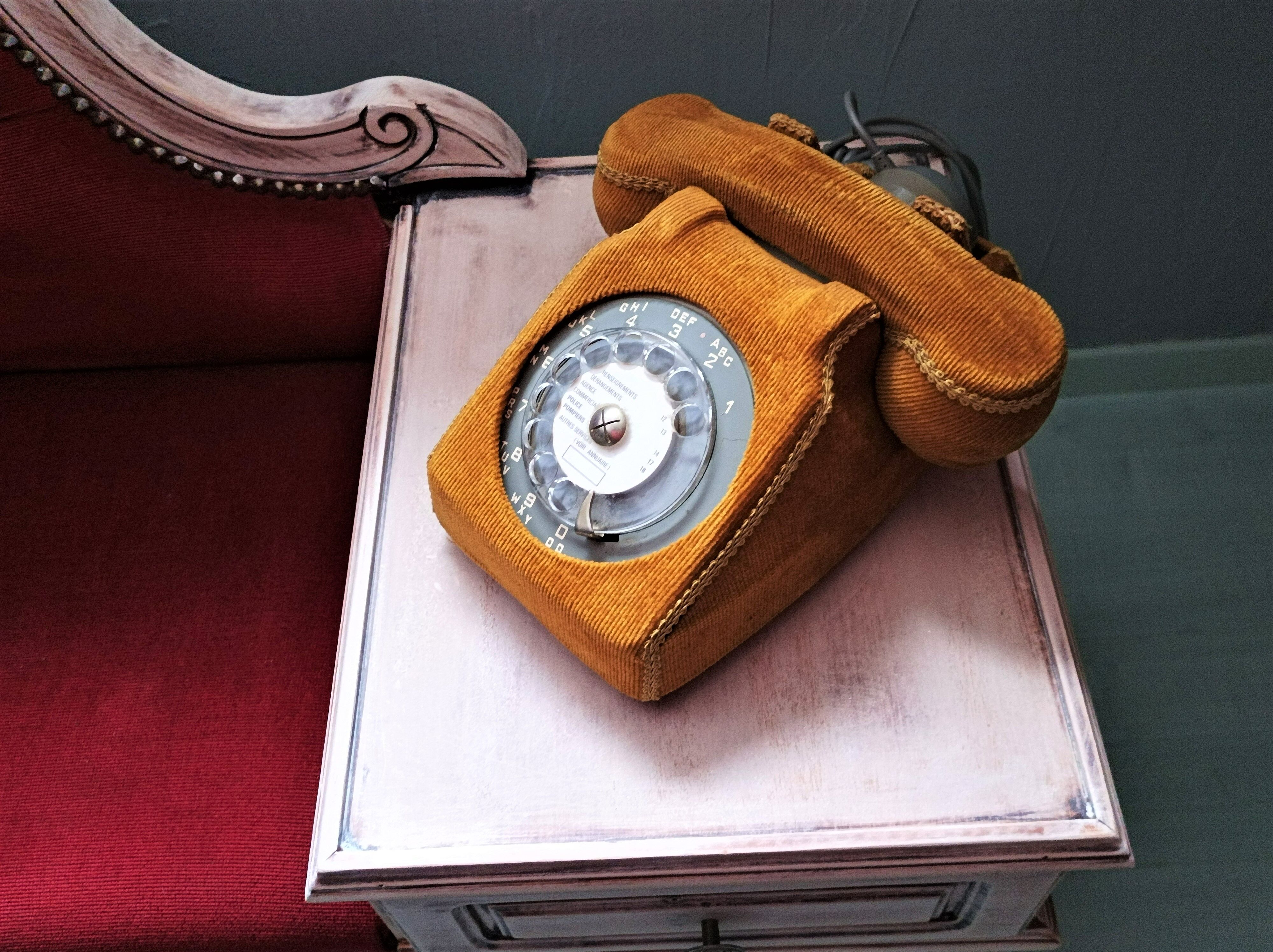 Telephone with rotary dial and its shell