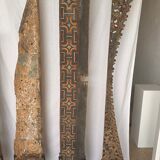 Rectangular Indonesian construction element with blue and yellow plant in carved wood