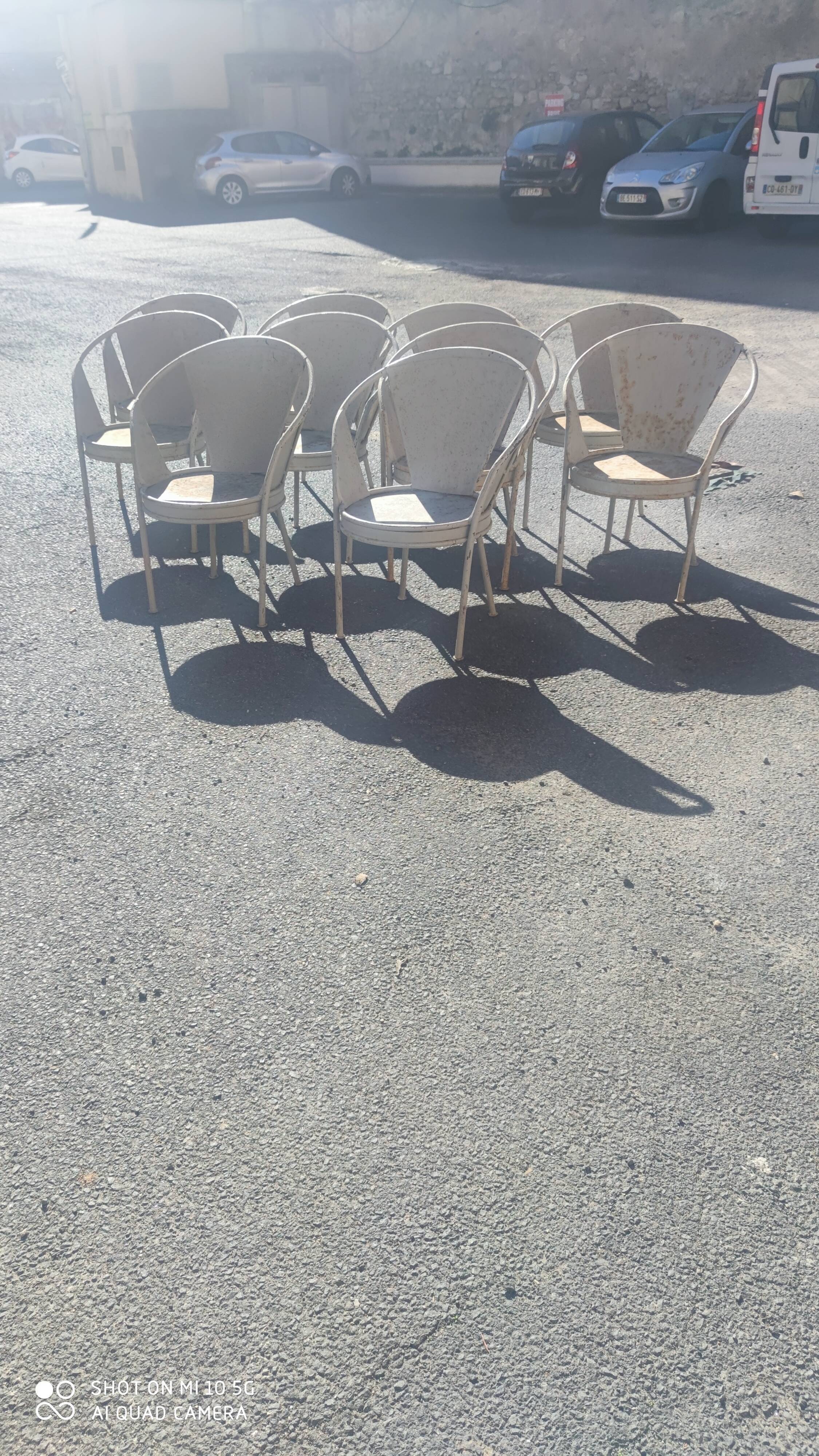 Series of 10 garden chairs made of steel garden patina