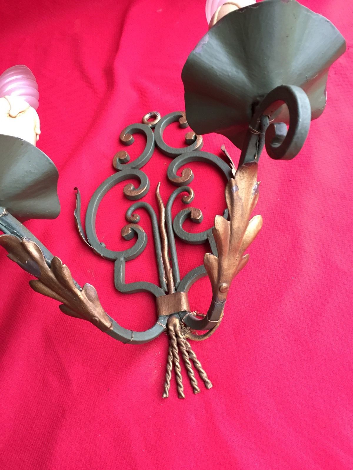 Pair of green wrought iron appliques with golden acanthus leaves