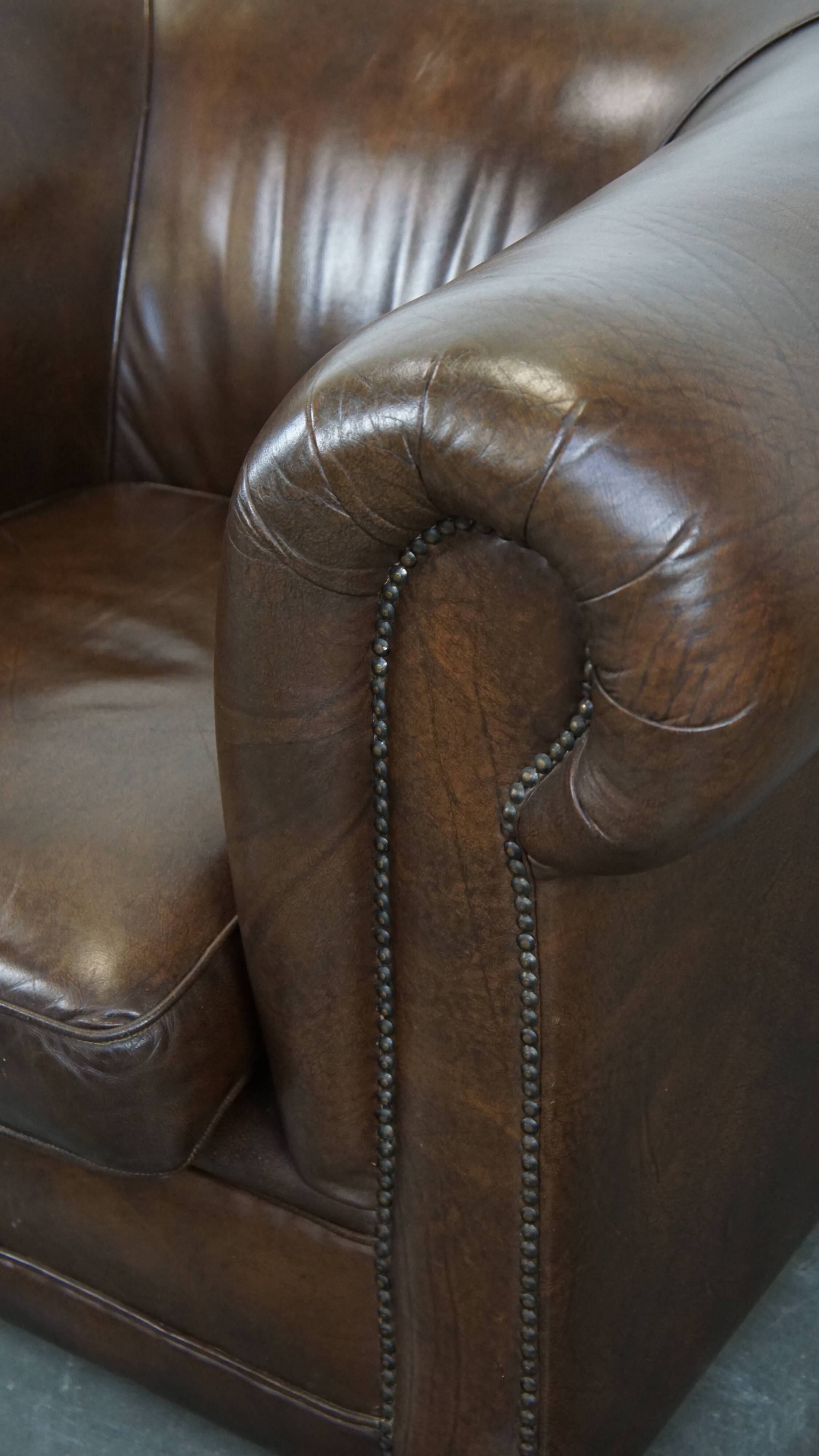 Large, Dark Cowhide Leather Chesterfield Armchair