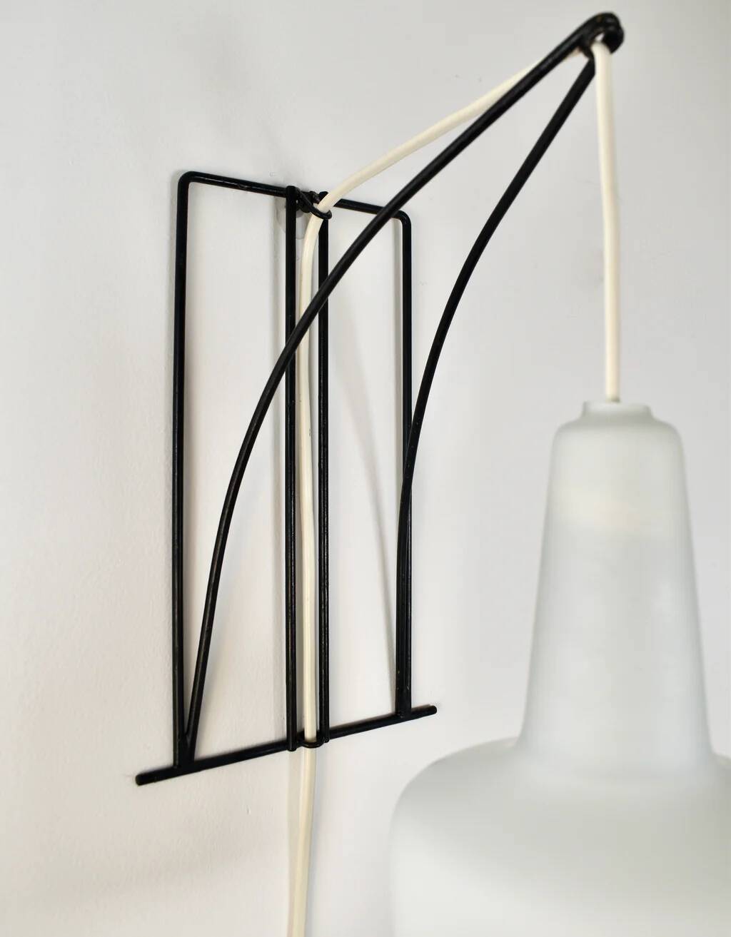 Modernist wall light with metal and glass wire