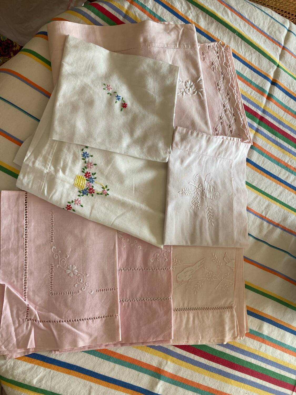 Set of embroidered baby bed sheets