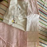 Set of embroidered baby bed sheets