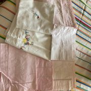Set of embroidered baby bed sheets
