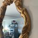 Old italian mirror in gilded plaster with leaf