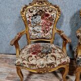 Pair of Louis XV style Baroque armchairs in gilded and carved wood circa 1900