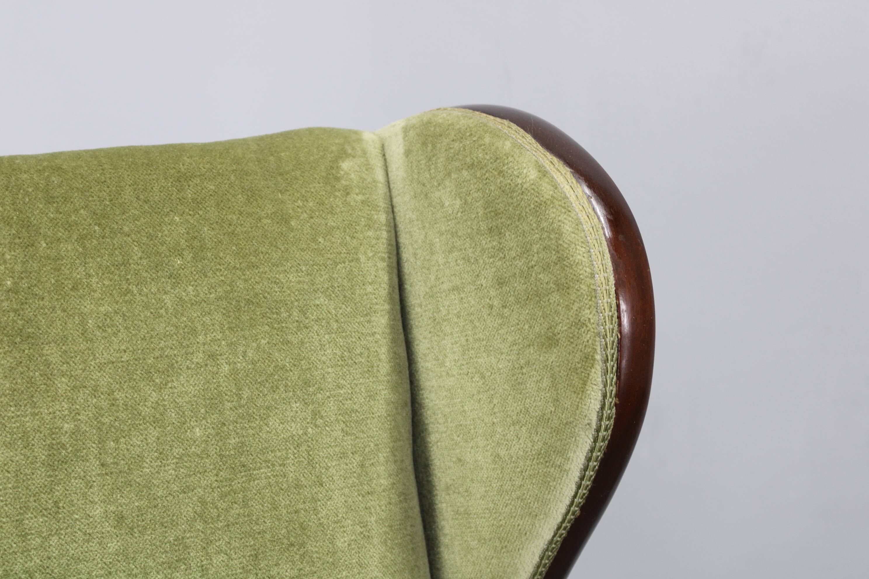 Danish mid-century wingback armchair by Frits Henningsen, 1950s