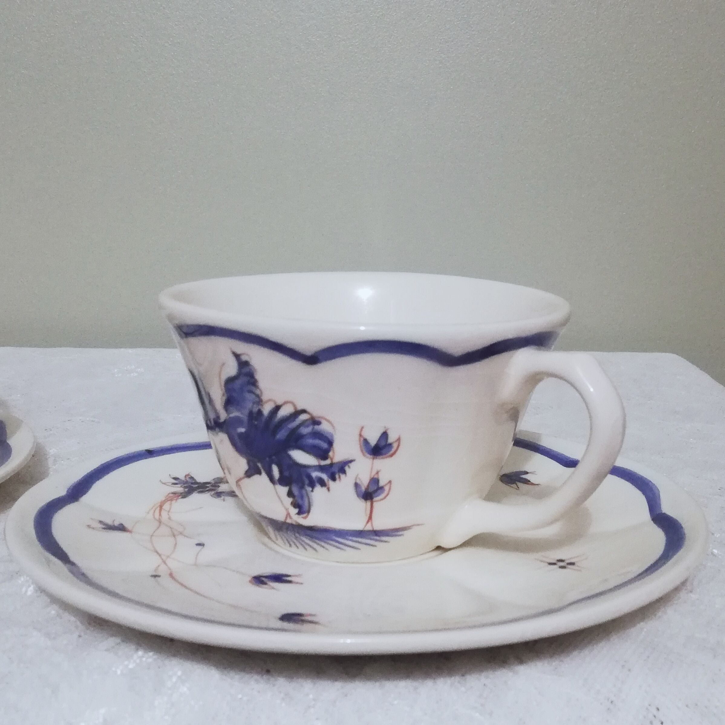 Two ceramic cups by Grignan signed Peguet