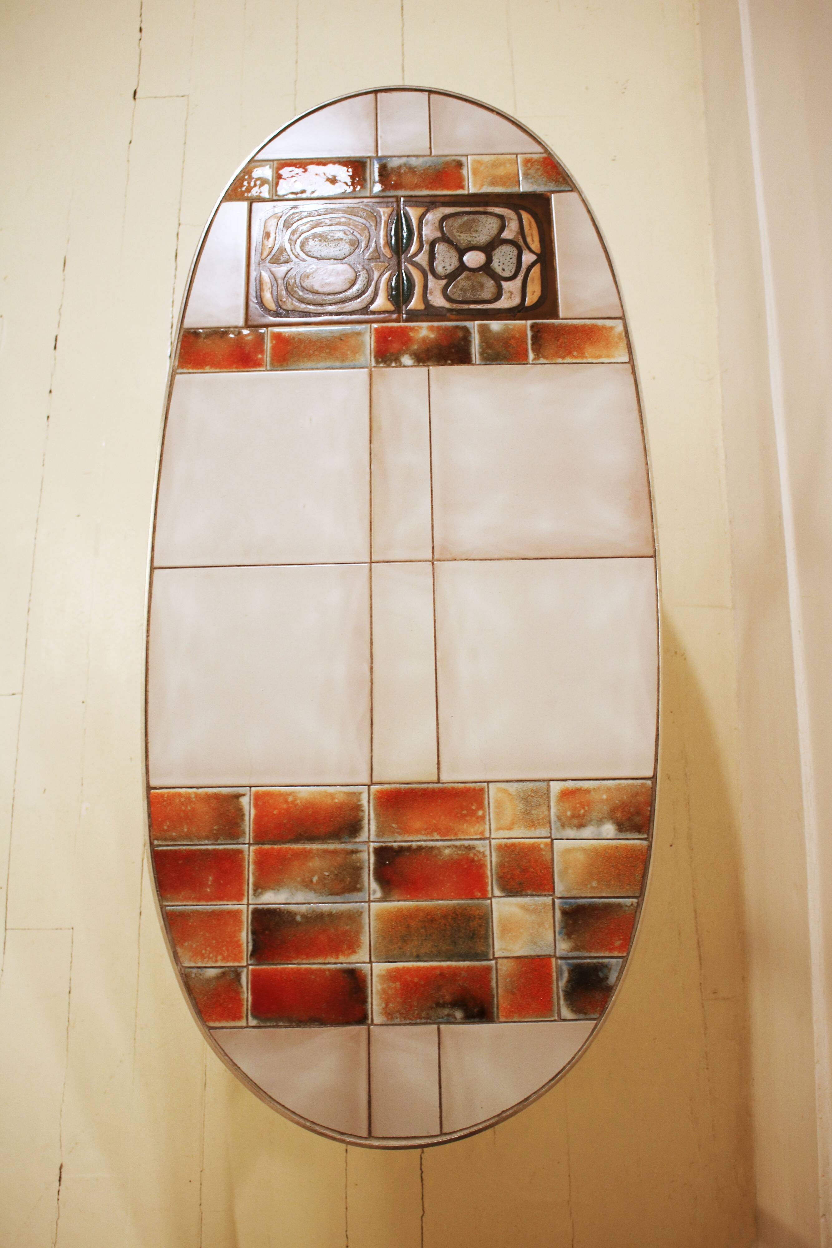 Oval coffee table in ceramic and metal – 1970s