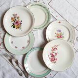 Flat earthenware plates with gilded edges