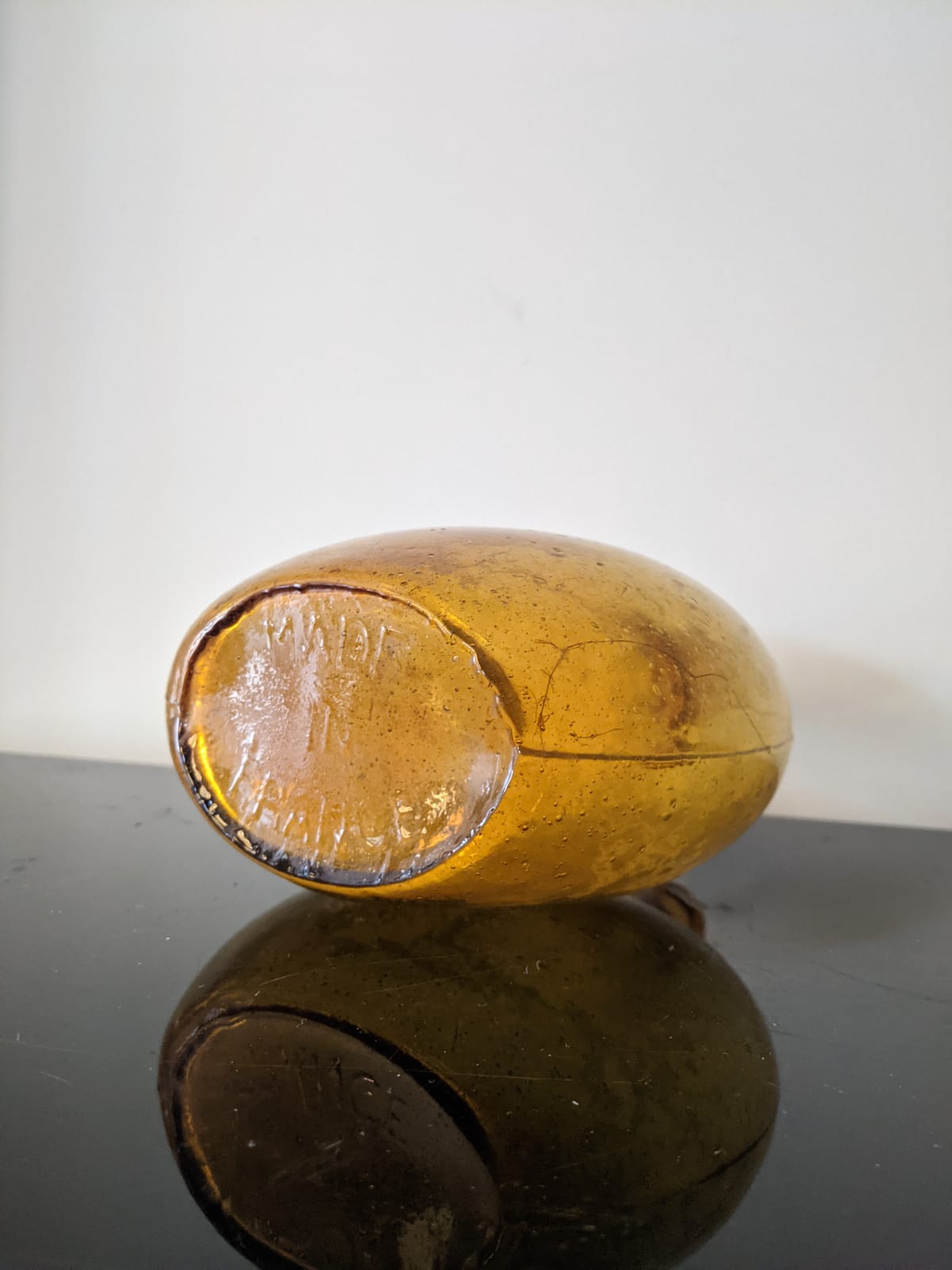 Old red glass demijohn