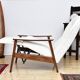 Fauteuil avec repose-pieds rabattable en Bouclé blanc crème, années 1960