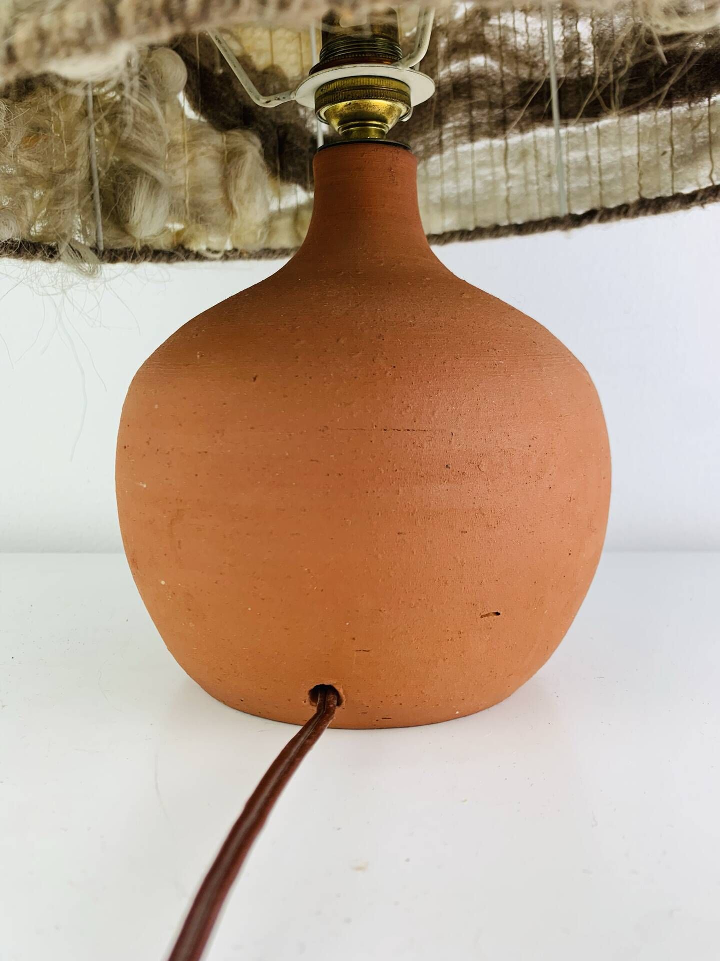 Terracotta globe lamp with a wool shade from the 1960s.
