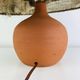 Terracotta globe lamp with a wool shade from the 1960s.