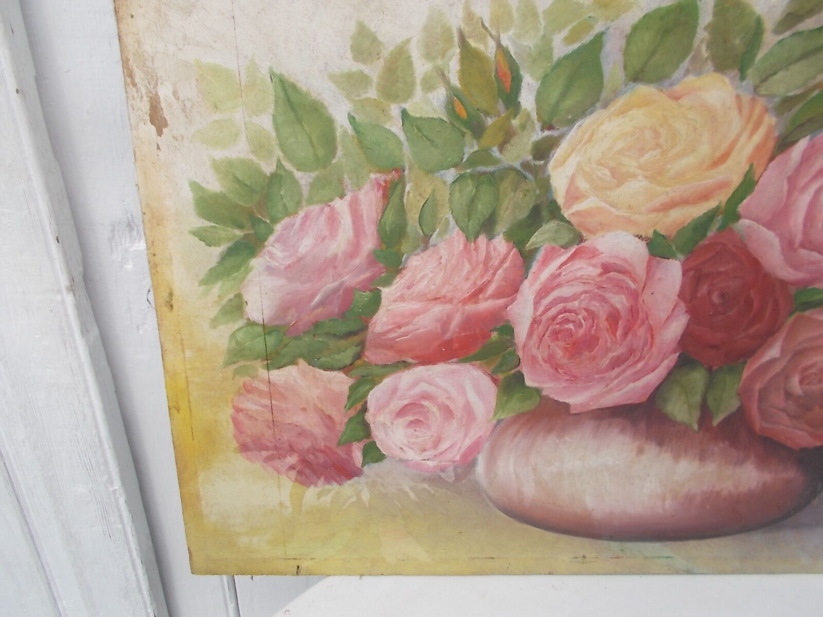 Tableau of a bouquet of flowers on a double-sided wooden panel.