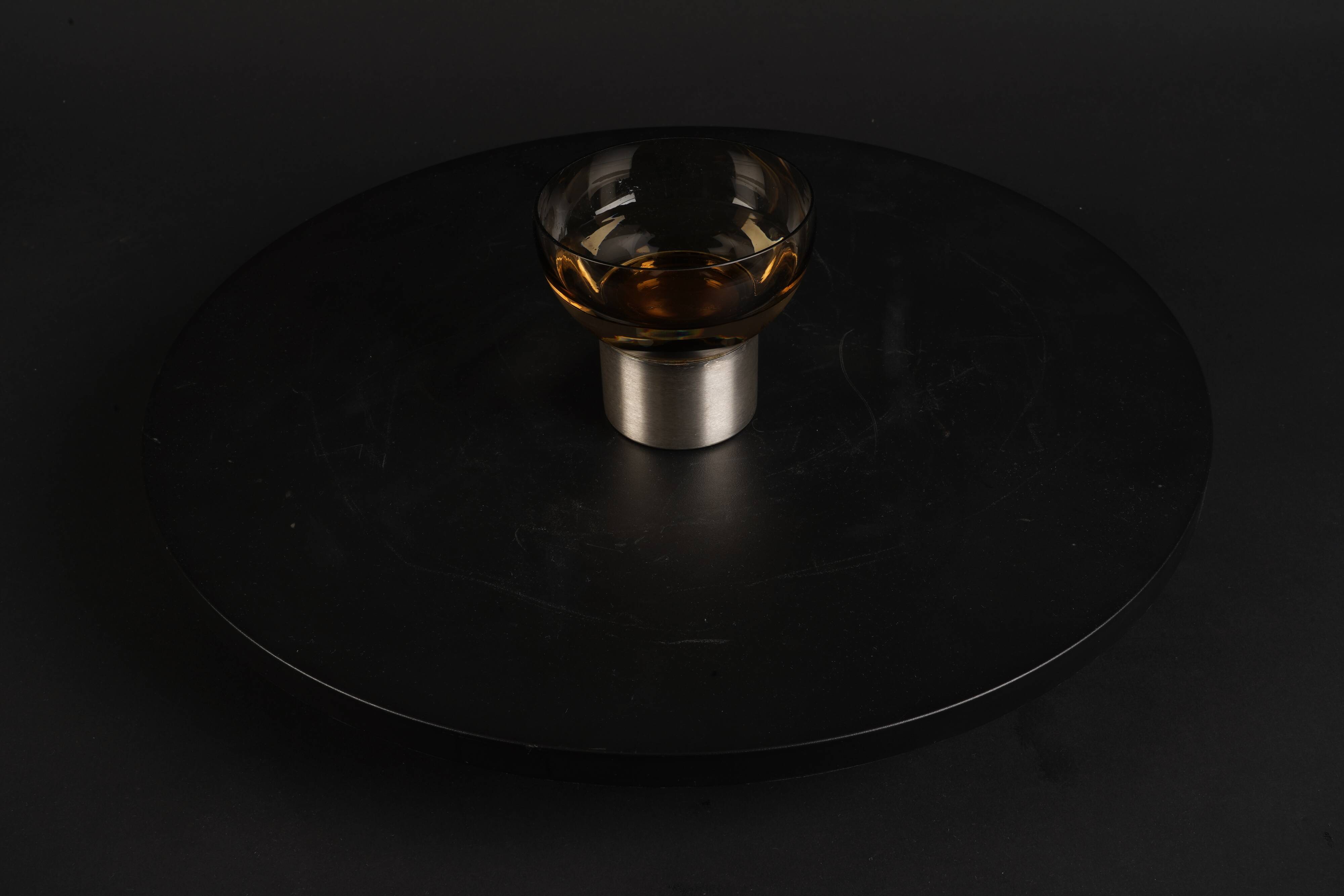 Set of six 1970s amber glass glasses mounted on brushed metal