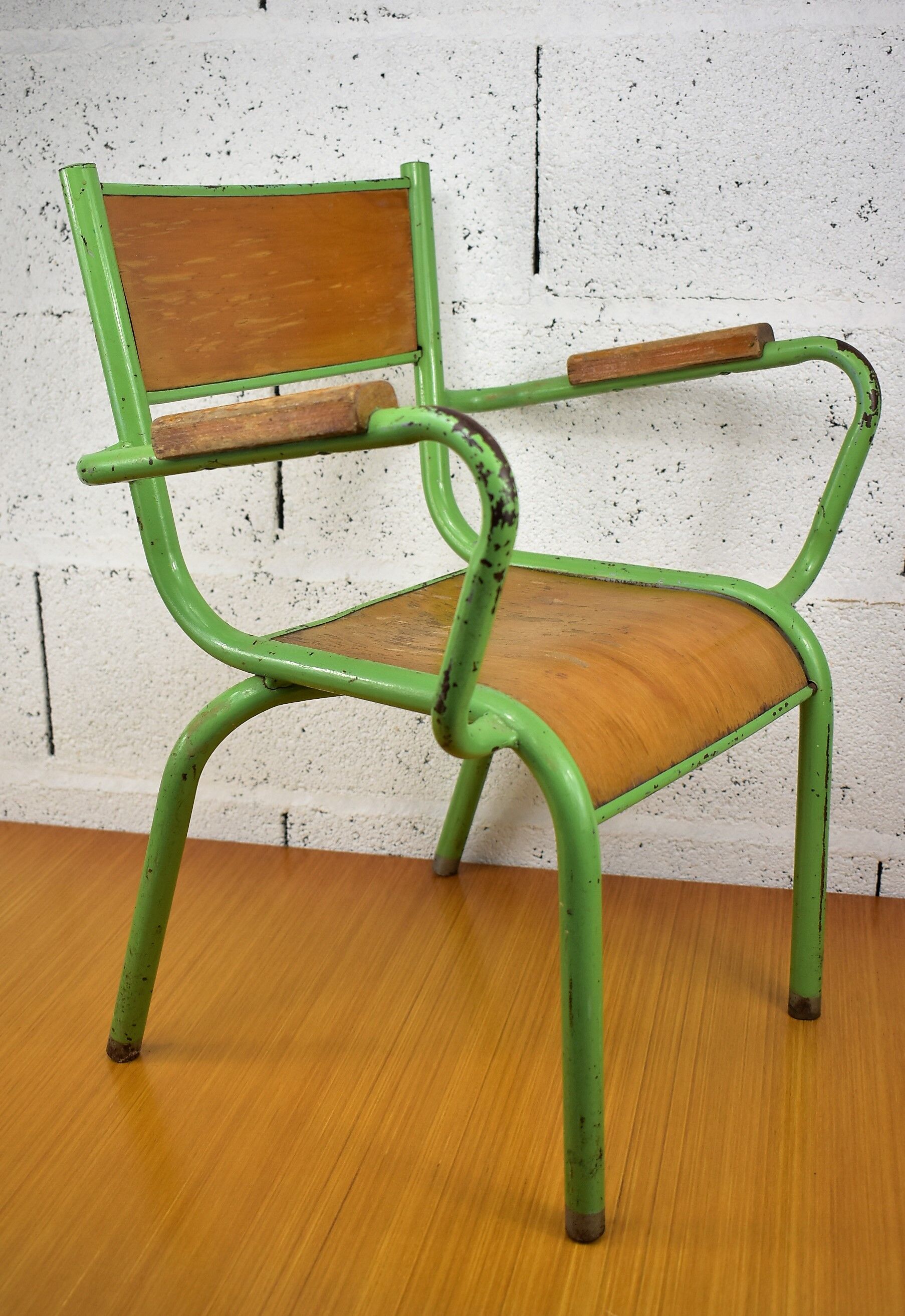 Metal and wood school chair with armrest