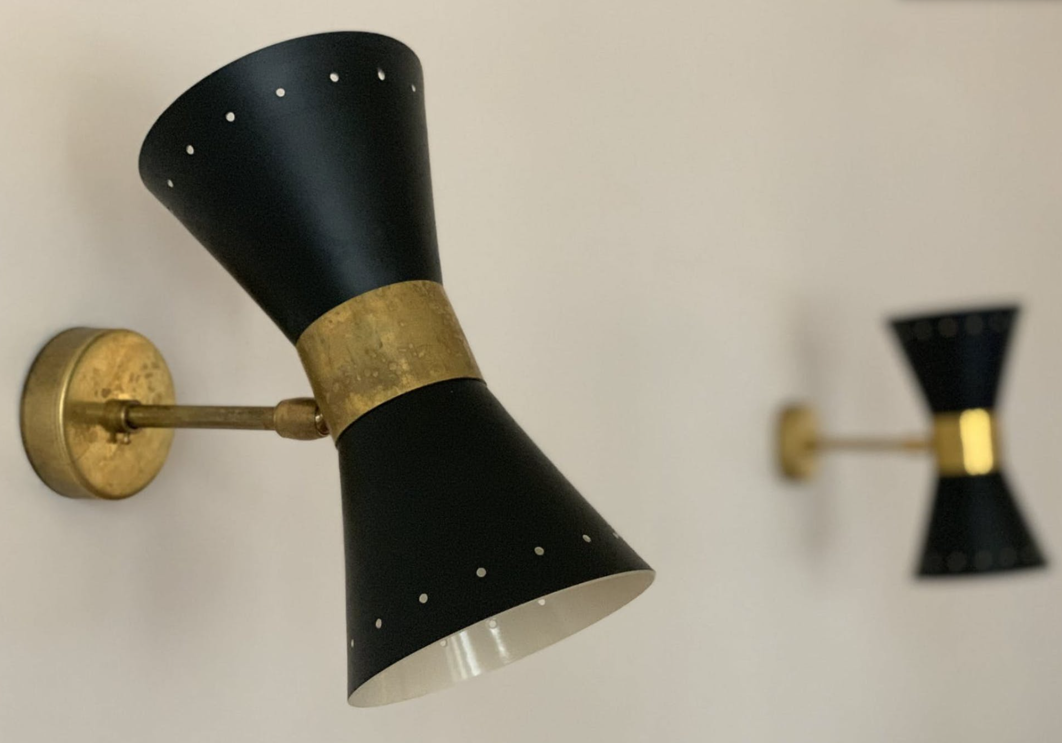 Pair of wall in the style of Italian creations of the 1950s