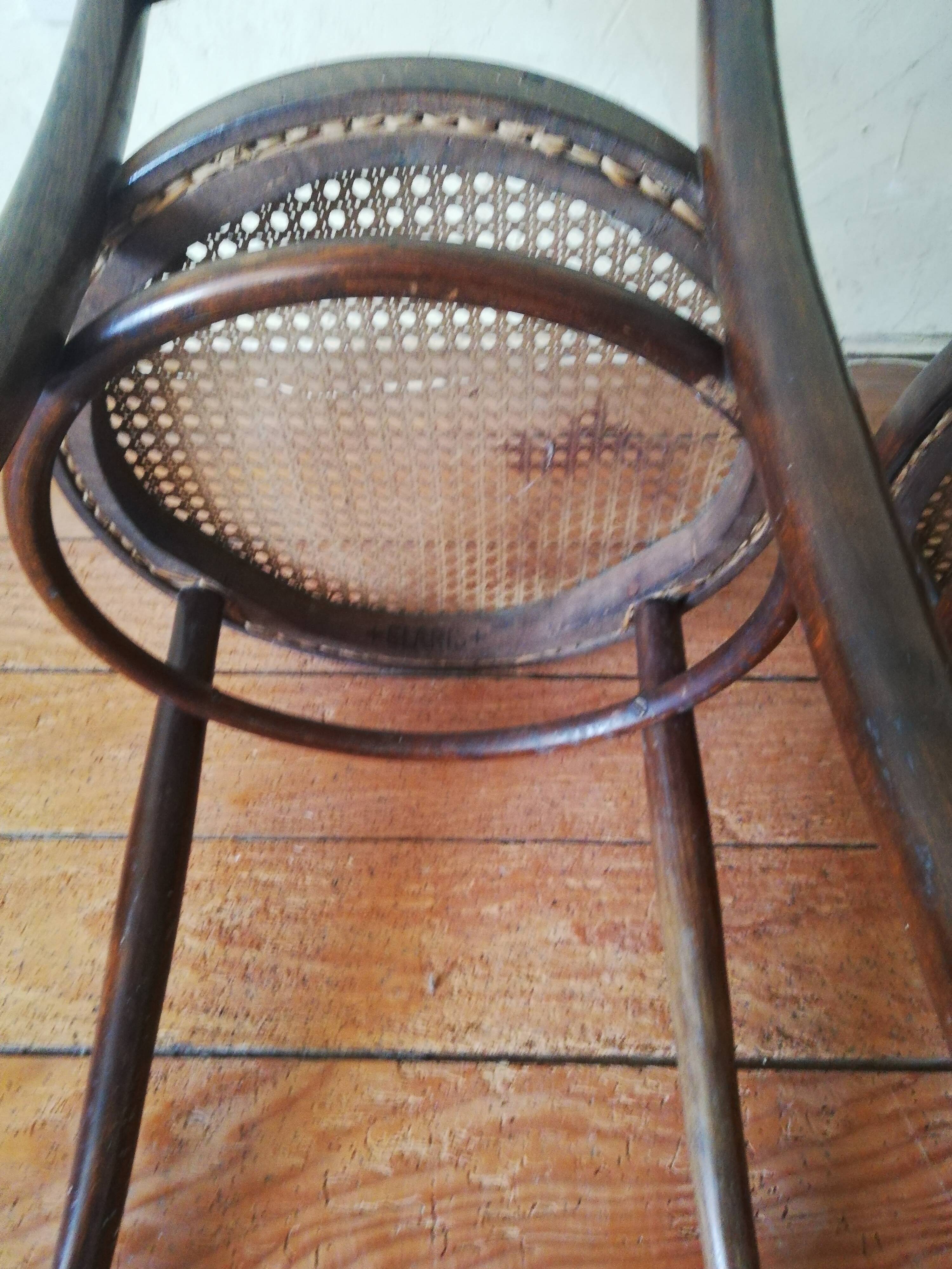 Old curved wooden bistro chairs