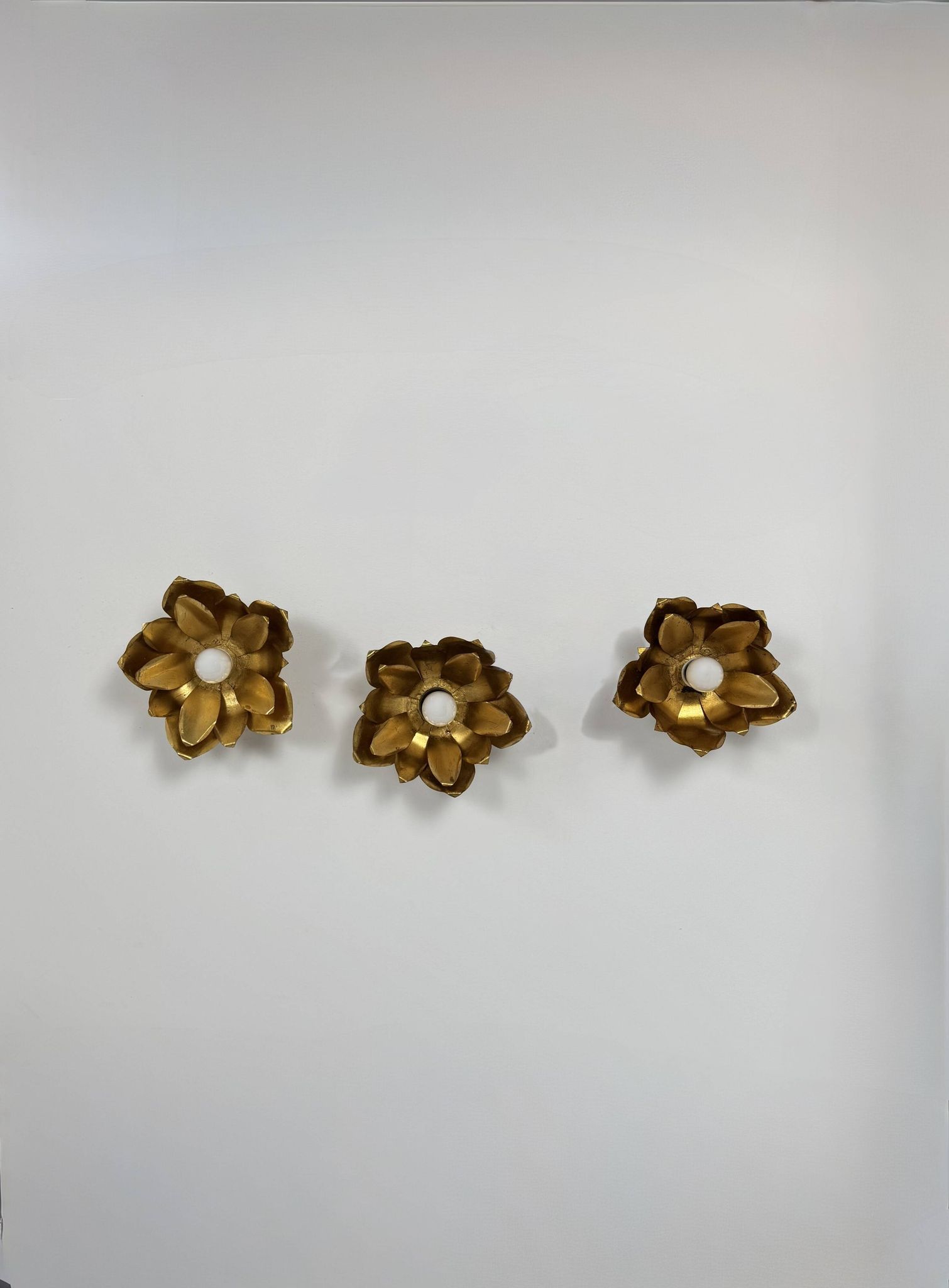 Set of 3 vintage flower wall lights, gold metal, France, 1970.