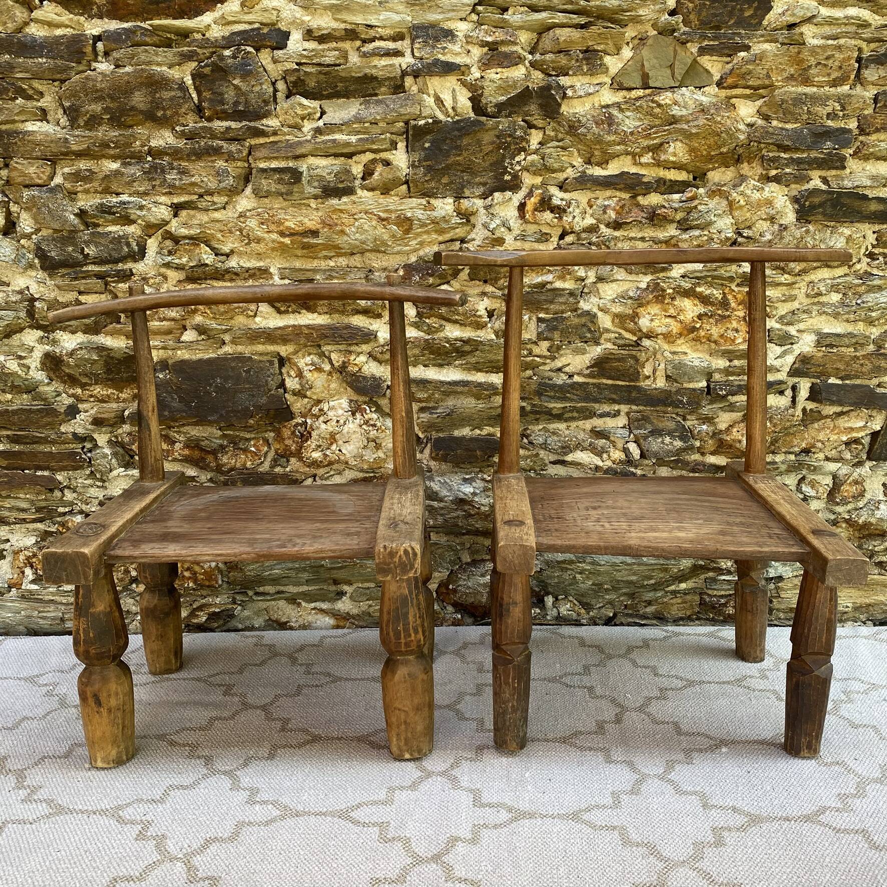 Ancient Baoulé African chairs in carved wood, Wabi-Sabi.