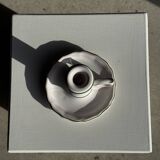 Small vintage hand-held candlestick in earthenware with green trim and floral decoration H10.5