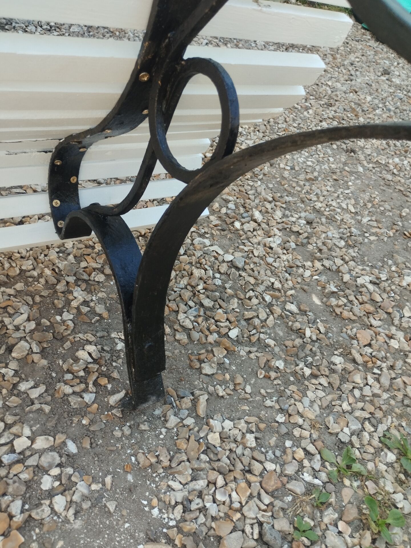 Antique garden bench with cast iron legs