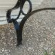 Antique garden bench with cast iron legs