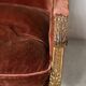 Two Louis XVI style wing chairs in gilded wood, 20th century