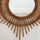 Rattan mirror in the shape of a star.