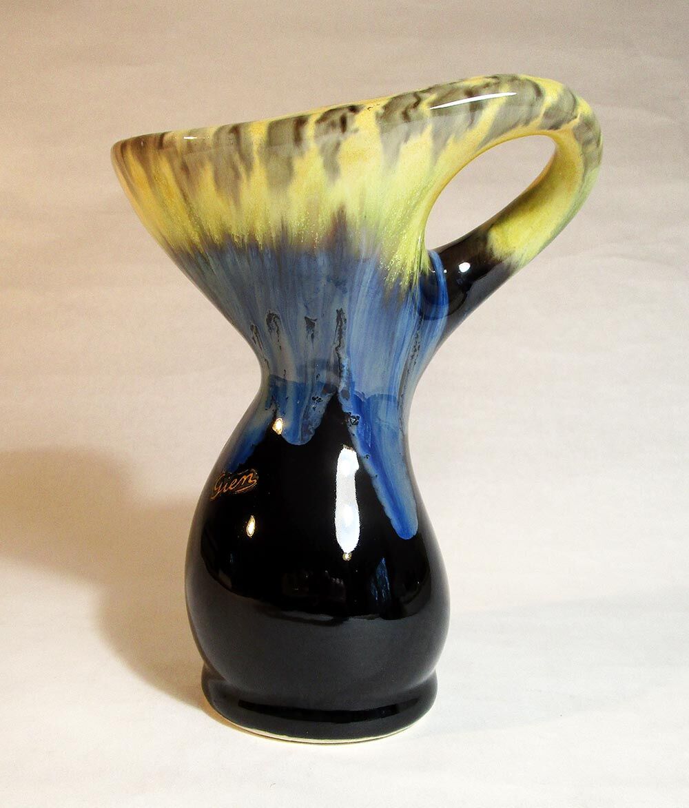 Vase with twisted handle