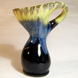 Vase with twisted handle