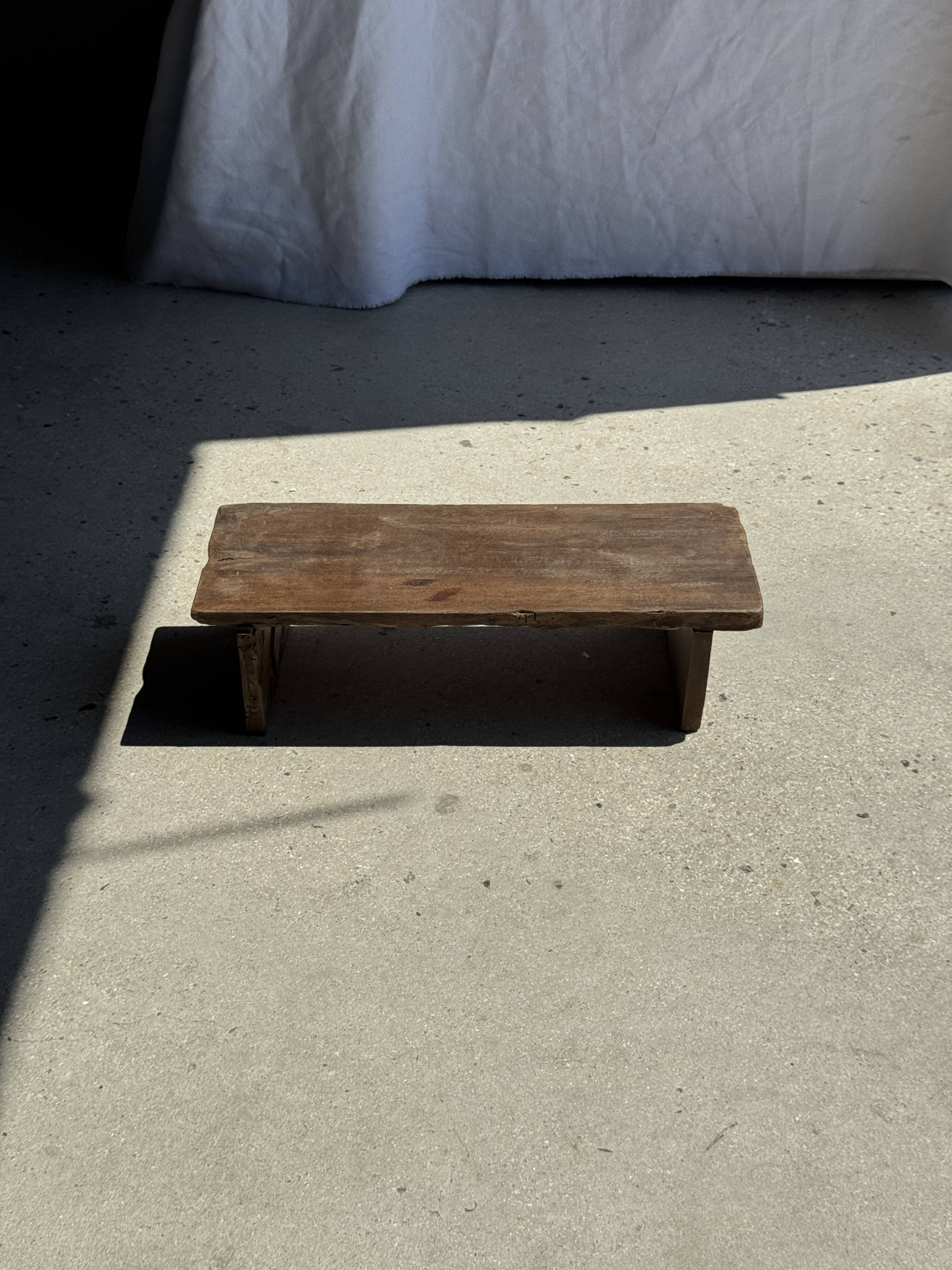 Small low bench in old teak from Indonesia H14 L50