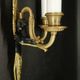 Pair of winged putti wall sconces in Louis XVI style - gilded bronze and black patina