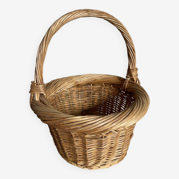 Beige round wicker basket