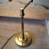 Large golden brass lamp with a movable arm - adjustable desk lamp