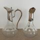 Glass decanters and silver metal spouts