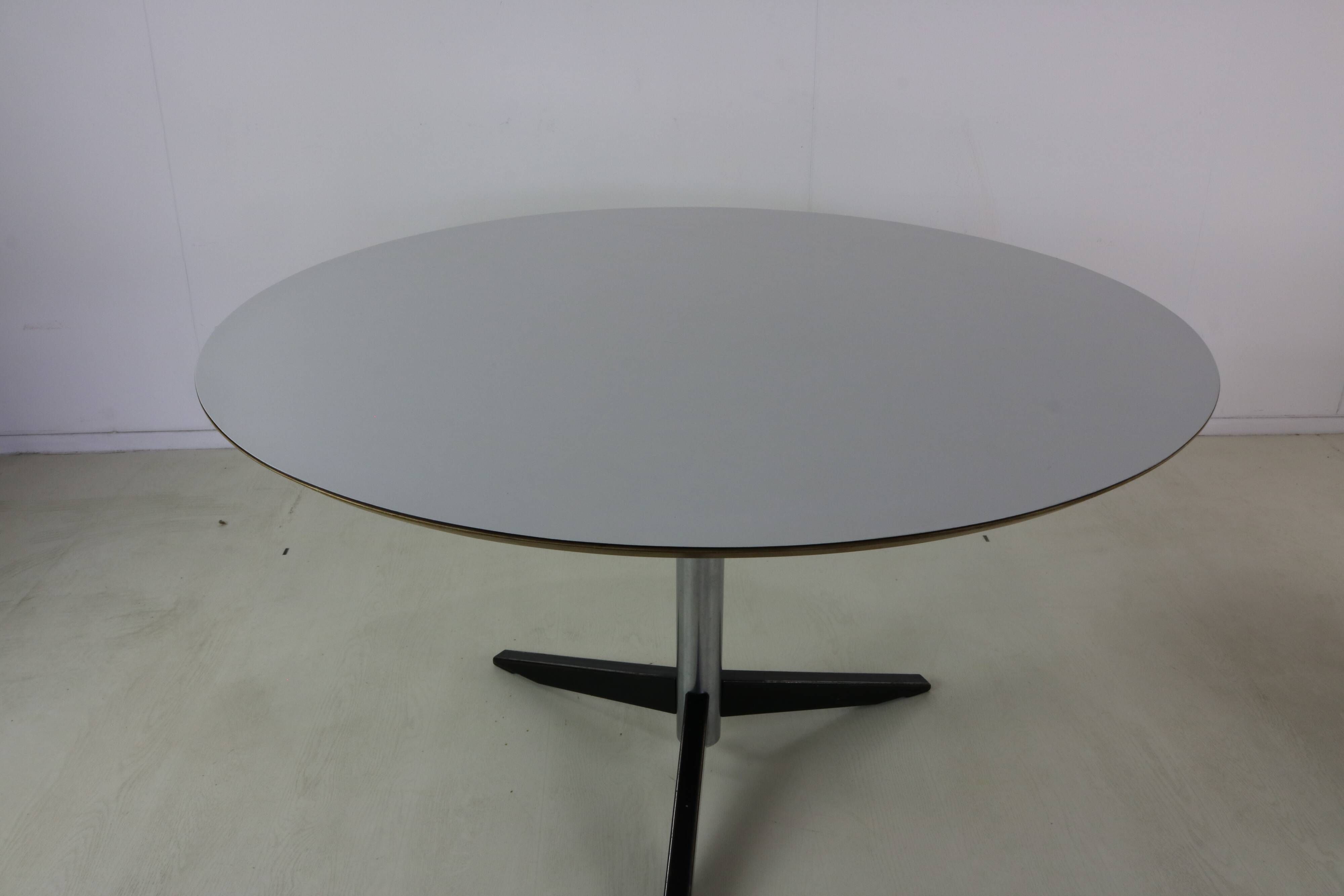 Sixties design round dining table by Martin Visser