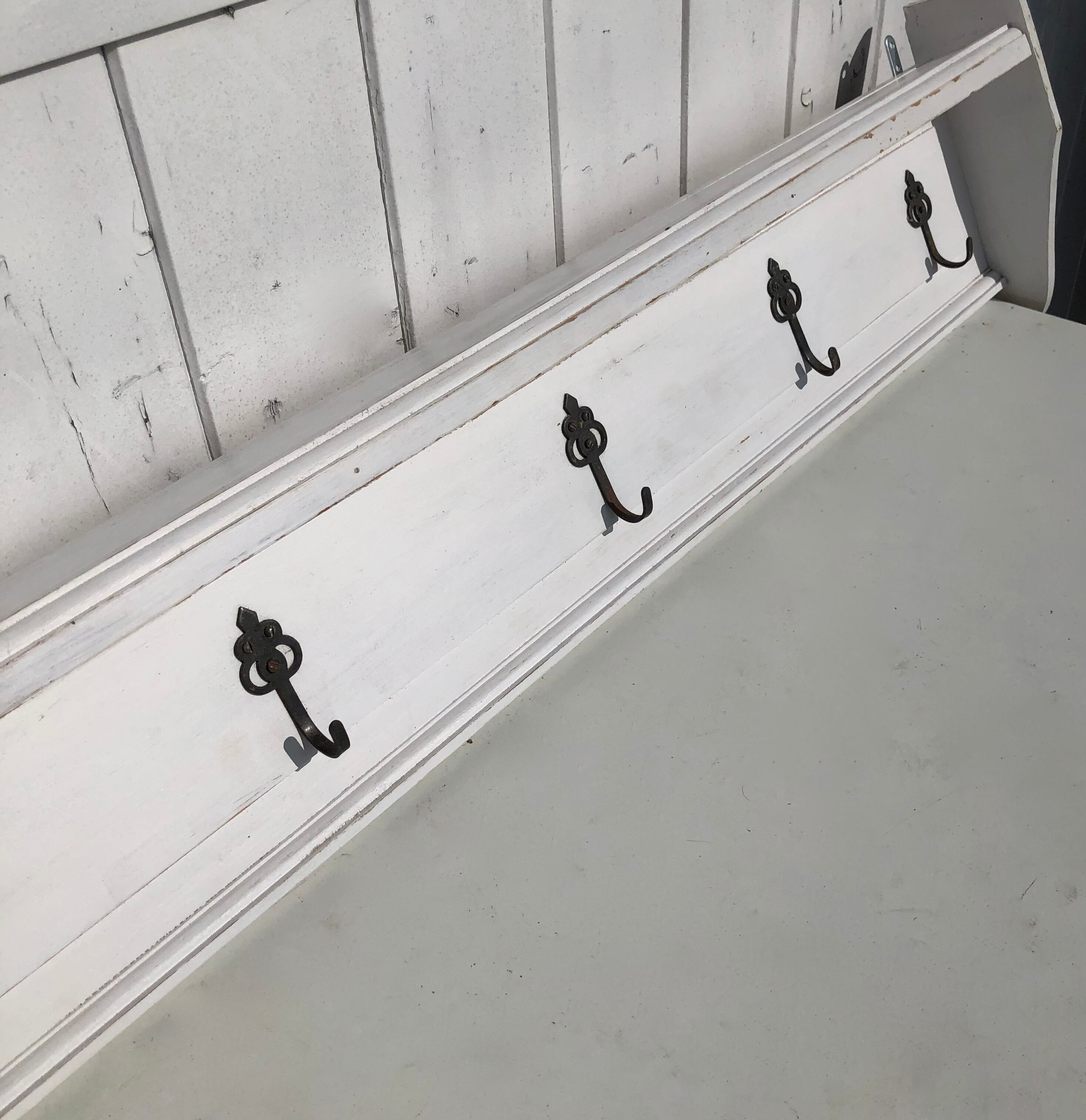 White wood wall coat rack